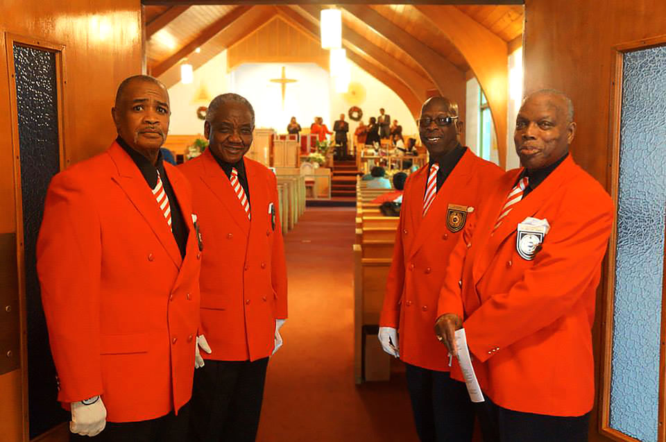 Ushers at the doorway